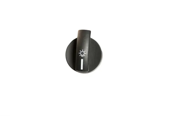 Headlamp control knob with etched light symbol