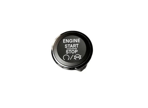 Molded and laser-etched engine start/stop button with chrome bezel