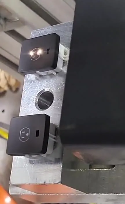 Laser etching switch buttons at Apollo Plastics